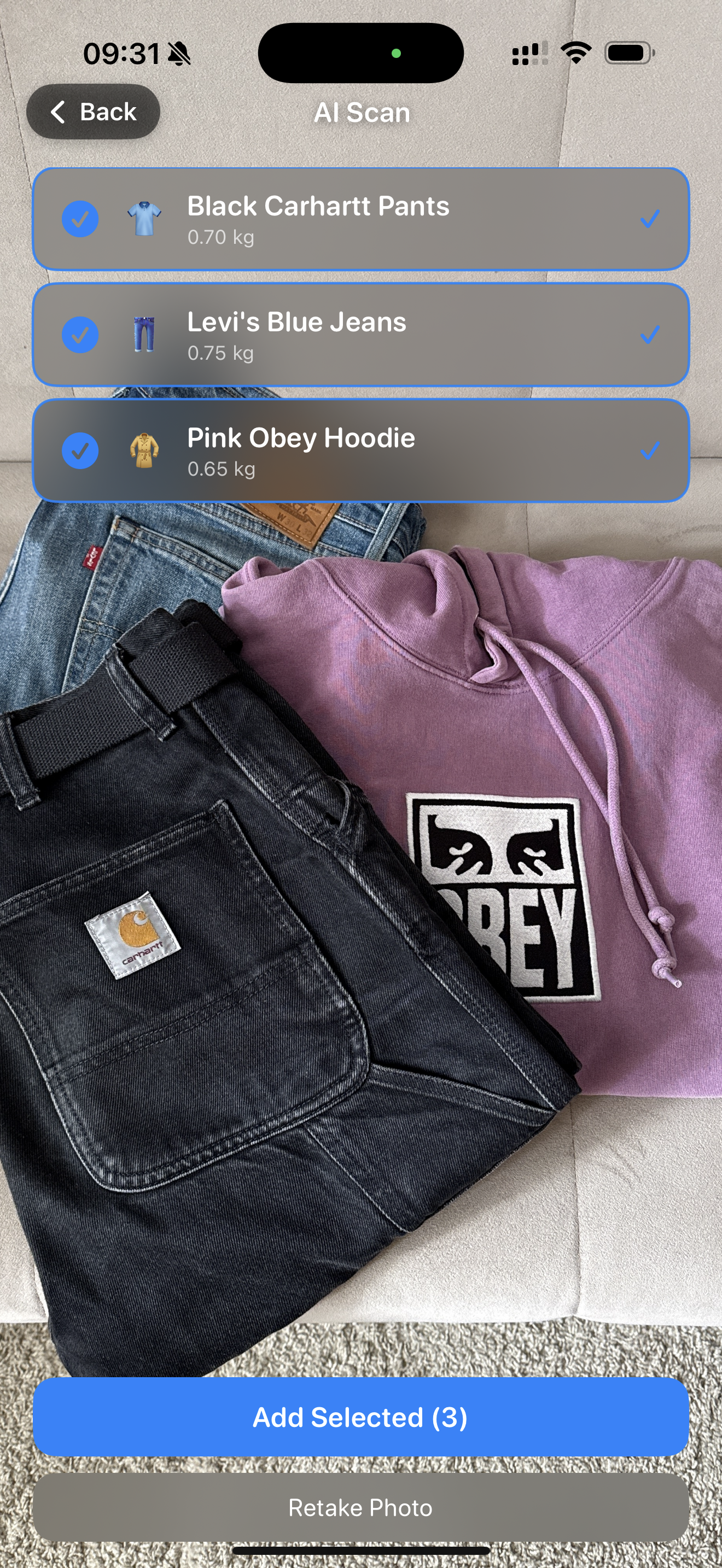 AI scanning Carhartt jeans and Obey hoodie
